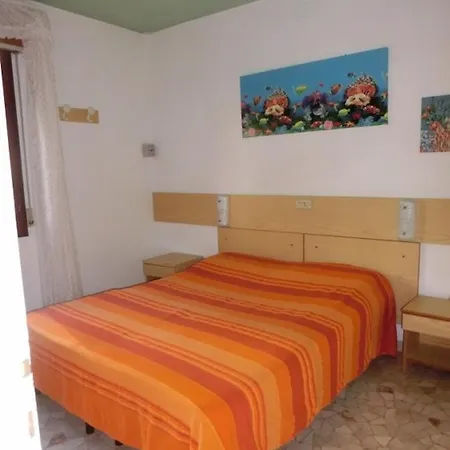 Апартаменты Three-bedroom With Garden, Parking And Ac Бибионе